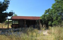 Detached, wooden house with 1 bed, 1500sqm of land 3km to the beach in an isolated location.  1