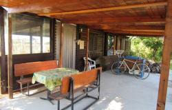 Detached, wooden house with 1 bed, 1500sqm of land 3km to the beach in an isolated location.  2