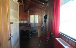 Detached, wooden house with 1 bed, 1500sqm of land 3km to the beach in an isolated location.  8