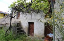 Detached ruin of 160sqm and garage with 1000sqm of land 1km from town 1