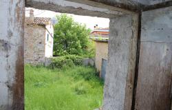 Detached ruin of 160sqm and garage with 1000sqm of land 1km from town 6