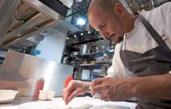 Chef Enrico Crippa working in the kitchen at Piazza Duomo in Alba Italy