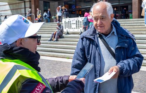 A steward checks QR codes in Venice