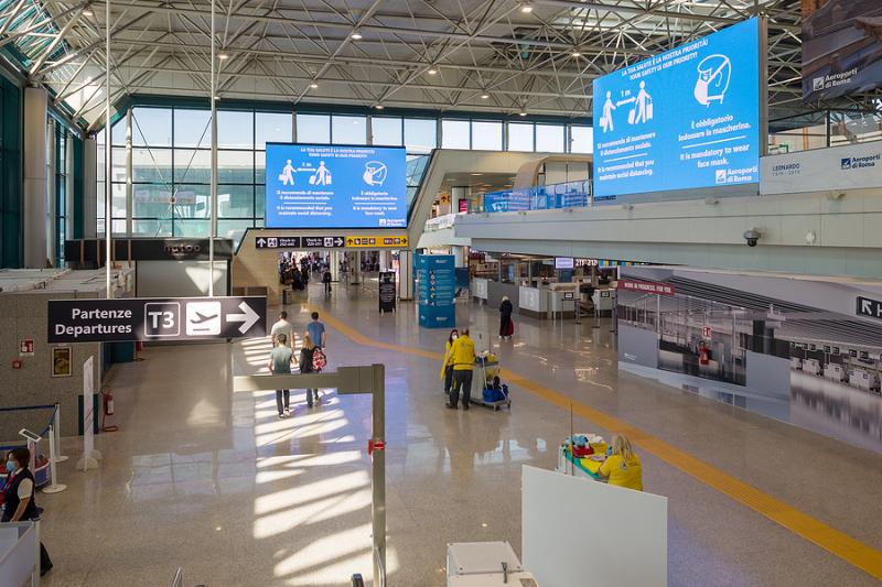 Covid signs at Fiumicino Airport in Rome Italy