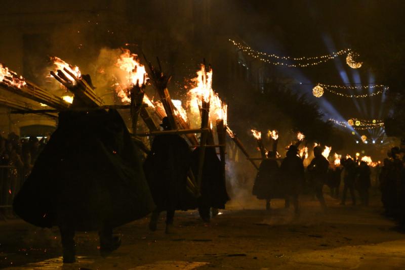 Men parade with torches at the 'Ndocciata ritual in Agnone, Molise
