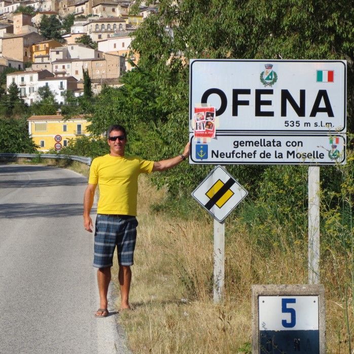 Chris standing at the Ofena sign