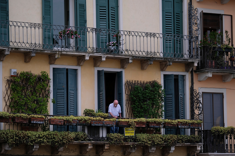 old person balcony italy old person balcony italy