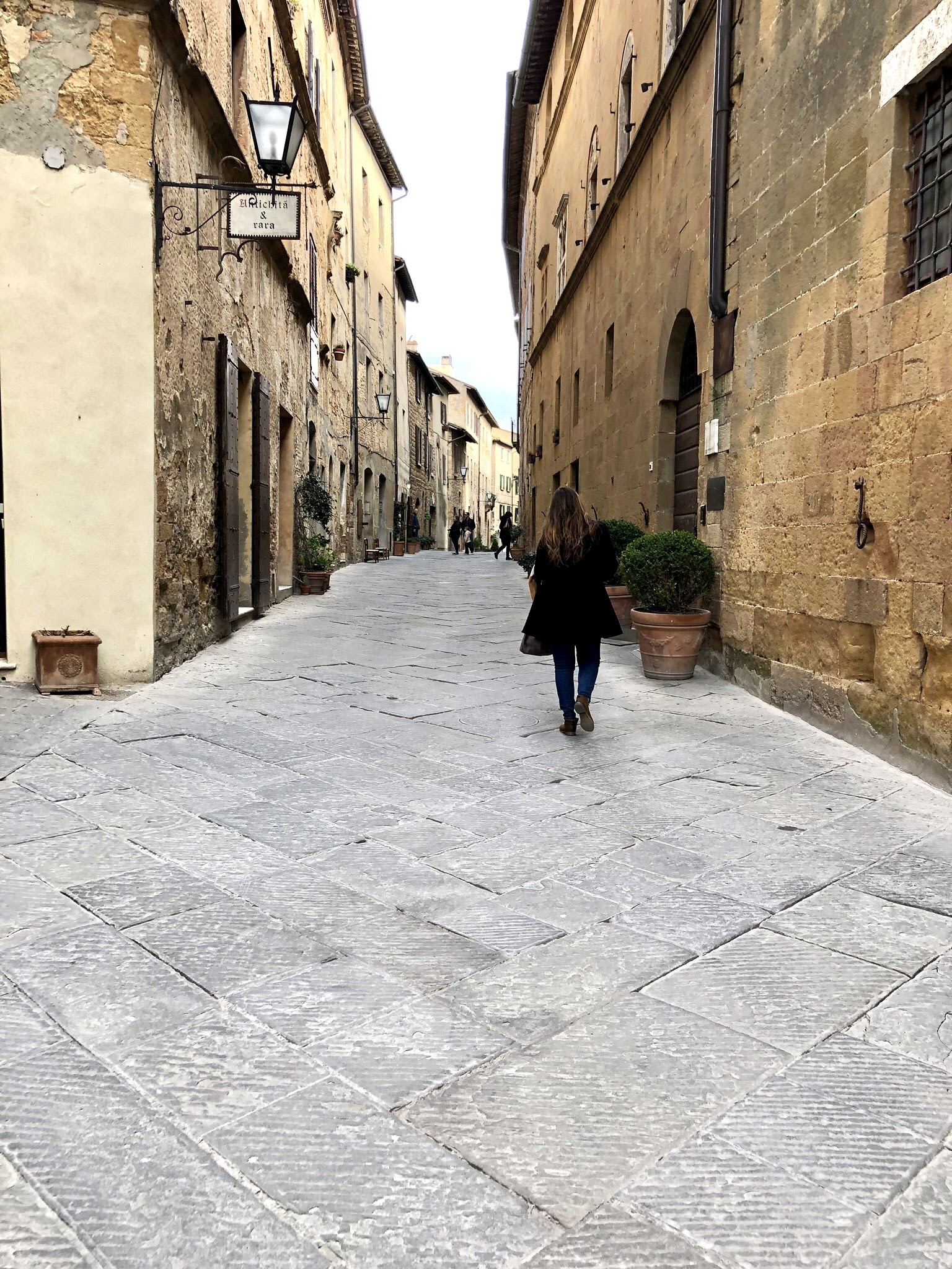 Megan Kunze walking the streets of Pienza