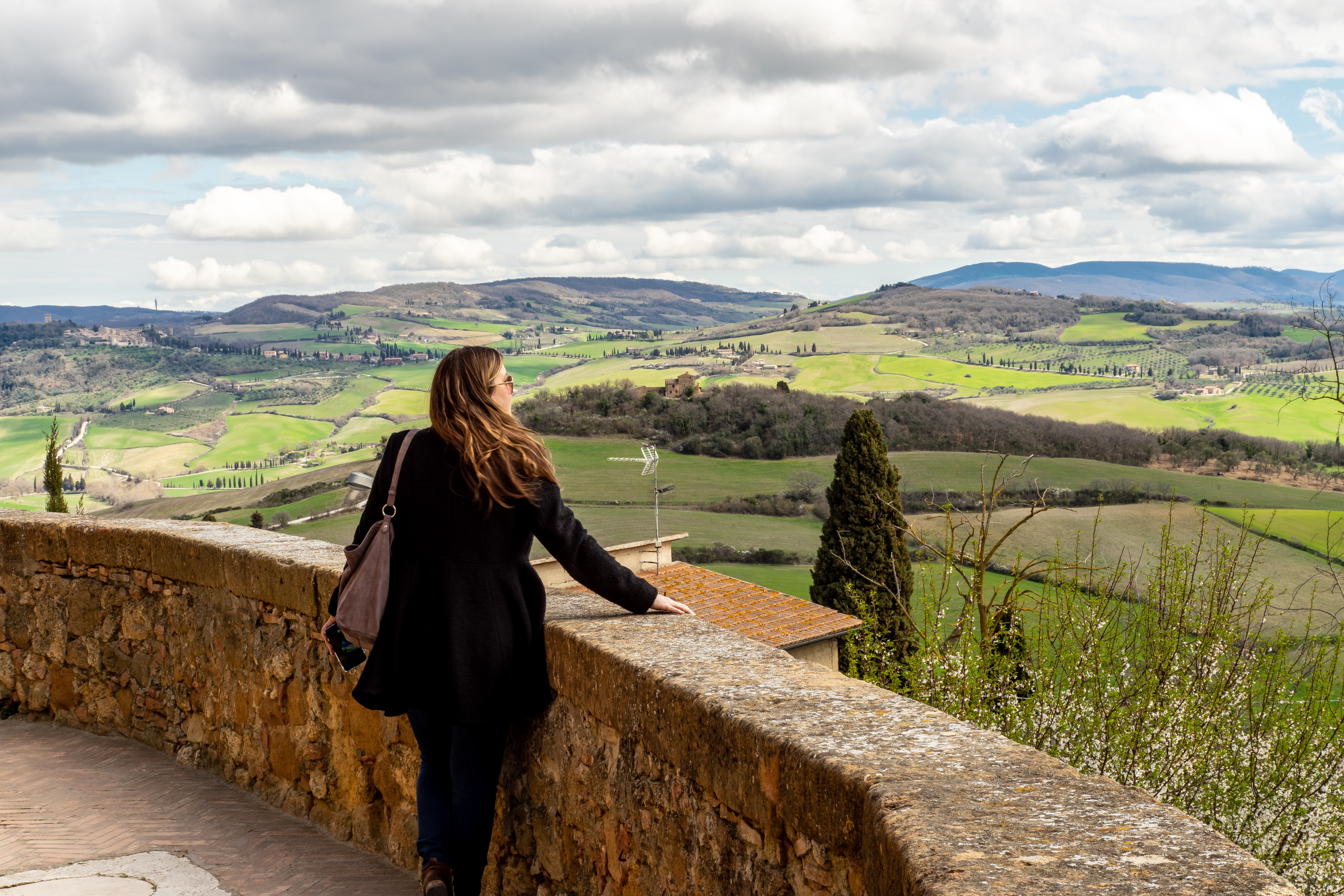 Megan Kunze looking at the Tuscan countryside in Pienza