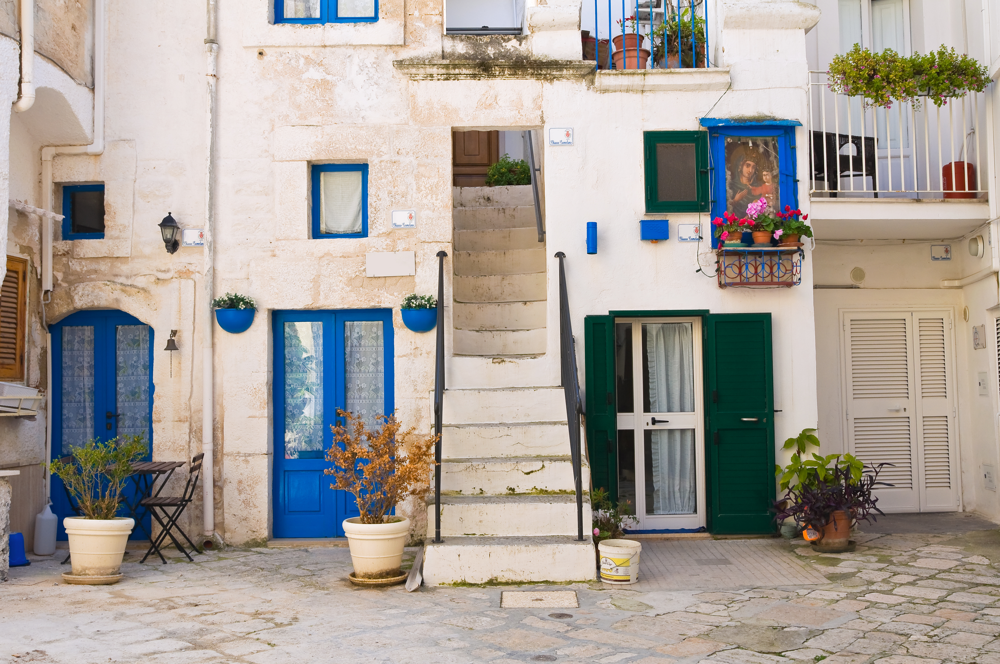 Traditionally styled homes in Monopoli, Puglia / Photo: Miti74 via Shutterstock