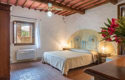 One of 9 bedrooms in the Tuscan villa