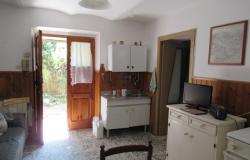 160sqm, detached, habitable, farmhouse of 100 years old with 2 out buildings and 1000sqm of land.  4