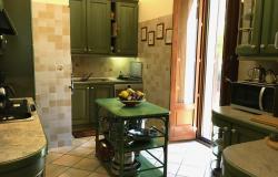 Kitchen with French doors to pergola