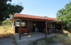 Detached, wooden house with 1 bed, 1500sqm of land 3km to the beach in an isolated location.  0