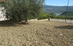 500sqm Building plot for 130sqm villa, with amazing mountain and lake views, 500 meters from the center, with garage and attic already built. 7
