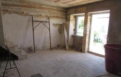 12km to the beach, stone town house, with 3 bedrooms, garage and partially renovated. 5