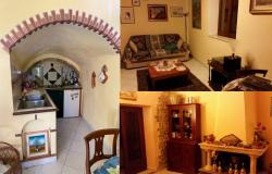 Characteristic tufa-rock house in the village of Pitigliano 7