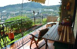 L1031 Apartment with garden and sea view for sale in Bordighera. 0