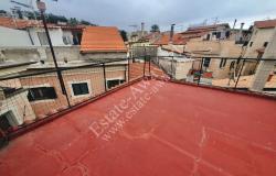 L1212 Apartment with terrace for sale in the historical centre of Bordighera. 1