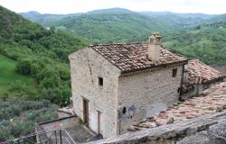 Stone, partially renovated town house with 15sqm terrace, garden and amazing views at the foot of a castle 0