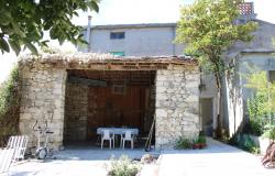 Detached, country, stone cottage in a panoramic position with barn, olive grove, garage, cellars and recently renovated  1