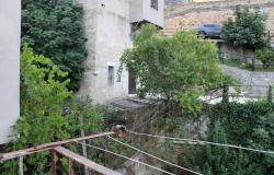 200 year old block with 2 apartments, drive and garden in the village center and open mountain views 10