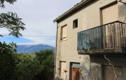 2 bed country house, 9000sqm of land, 200 meters to lively town and fabulous mountain views  1