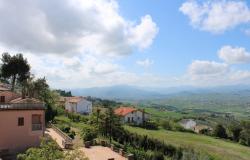 4 beds, 3 bathrooms, amazing views, terrace, patio, center of vibrant town, 15km to beach, can create 2 separate rental units  15