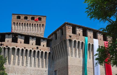 Italian flag draped over Castle of Montechiarugolo Emilia-Romagna