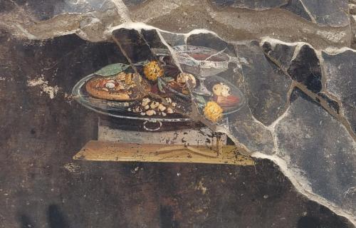 Detail of the fresco depicting what may be an "ancestor" of modern pizza
