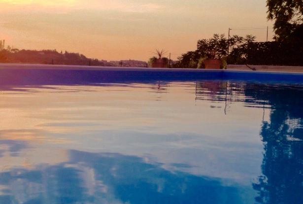 Sunset Over The Pool