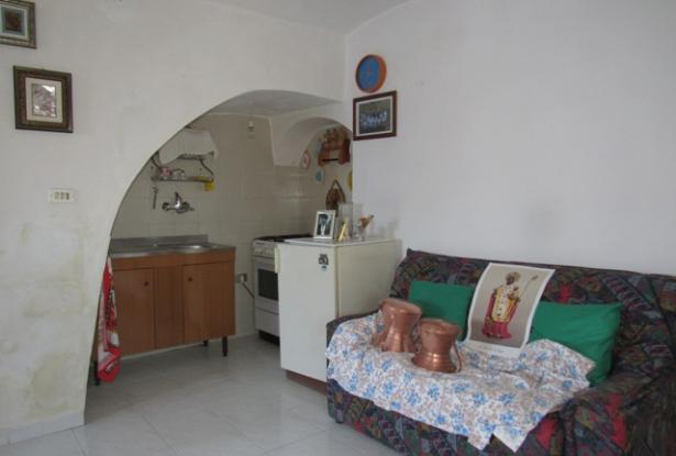 Historic center of town, perched on the hill top with amazing mountain views, 3 bedrooms habitable with outbuildings. 6