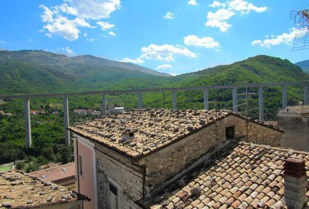 Stone , semi-detached with garden to restructure. Located in a panoramic position 11