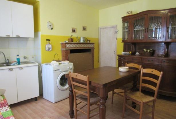 3 bedroom, habitable town house with terrace, garden and outbuilding to rebuild. 2