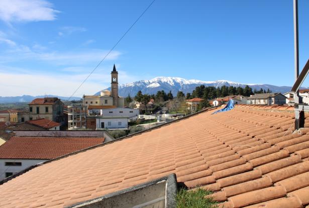 700sqm block of flats with 5 floors, sea and mountain views, 2000sqm of land in the center of town, one apartment finished, great B &amp; B potential.  10