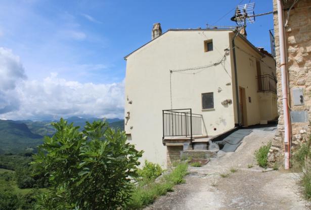 Duplex apartment above a stream, stone structure, habitable, 3 beds, amazing open views, background rushing water 0