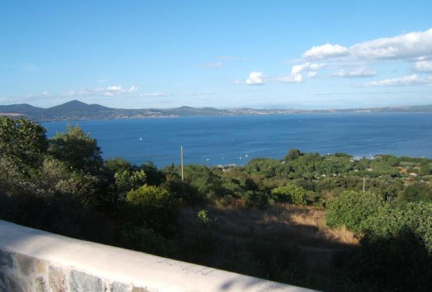 View of the lake from the piazza at the end of the street Apartment restored in the medieval borgo of Bracciano on Lake Bracciano, Rome Province, Lazio 13