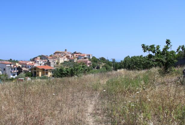 900sqm building plot, flat land, for a Villa of 200sqm with some fruit trees, sea and village views, 200 meters from the center, 8km to the beach  4