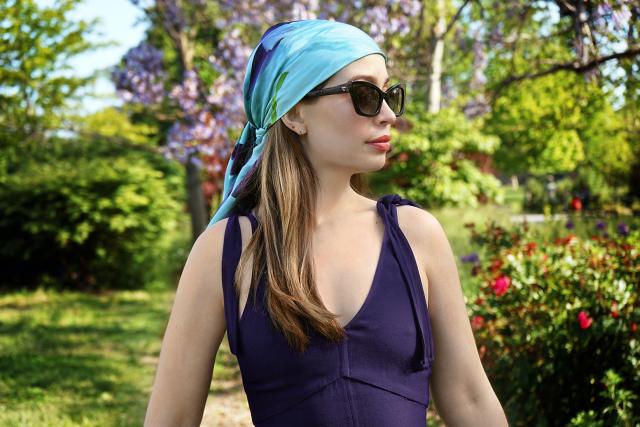 Orchid scarf worn by model as a headwrap