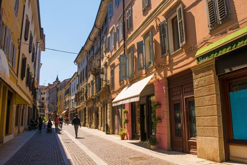 People walk down the historic Via Rastello in the north eastern Italian city of Gorizia in the Friuli Venezia Giulia region