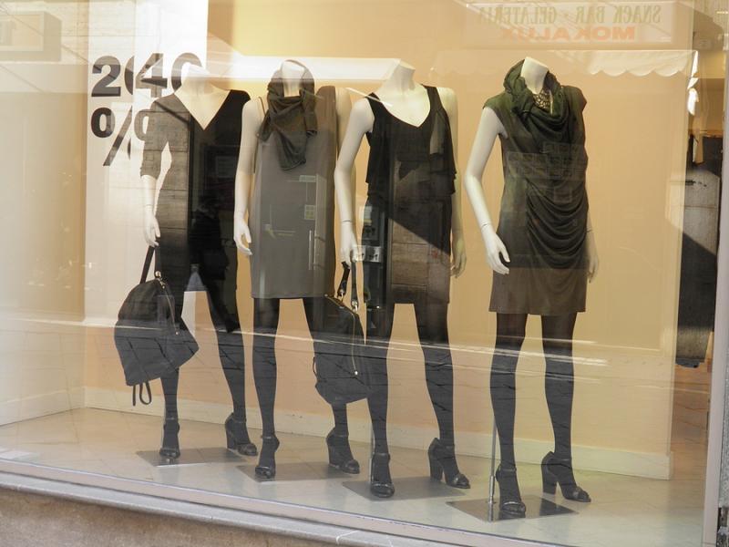 Italian fashion boutique Female mannequins in shop window at Italian fashion boutique