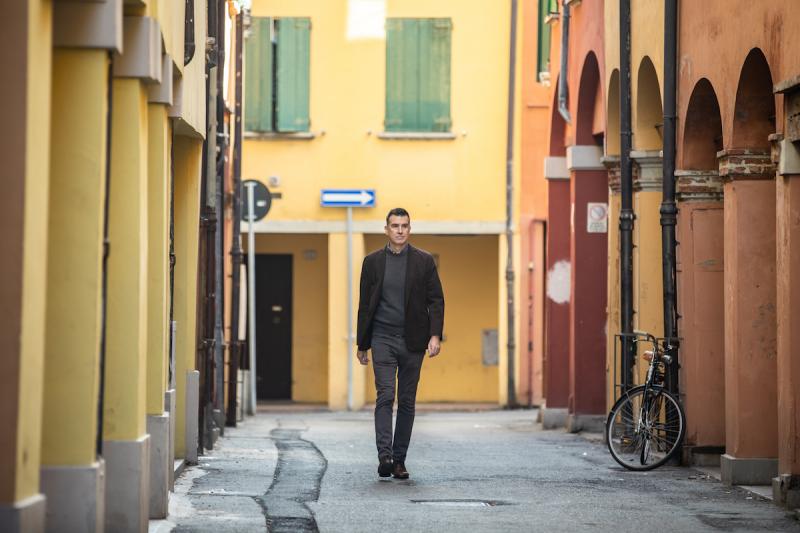 Tom Benjamin walking in Bologna