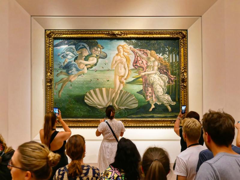 Tourists admire Botticelli's Birth of Venus at the Uffizi Gallery.