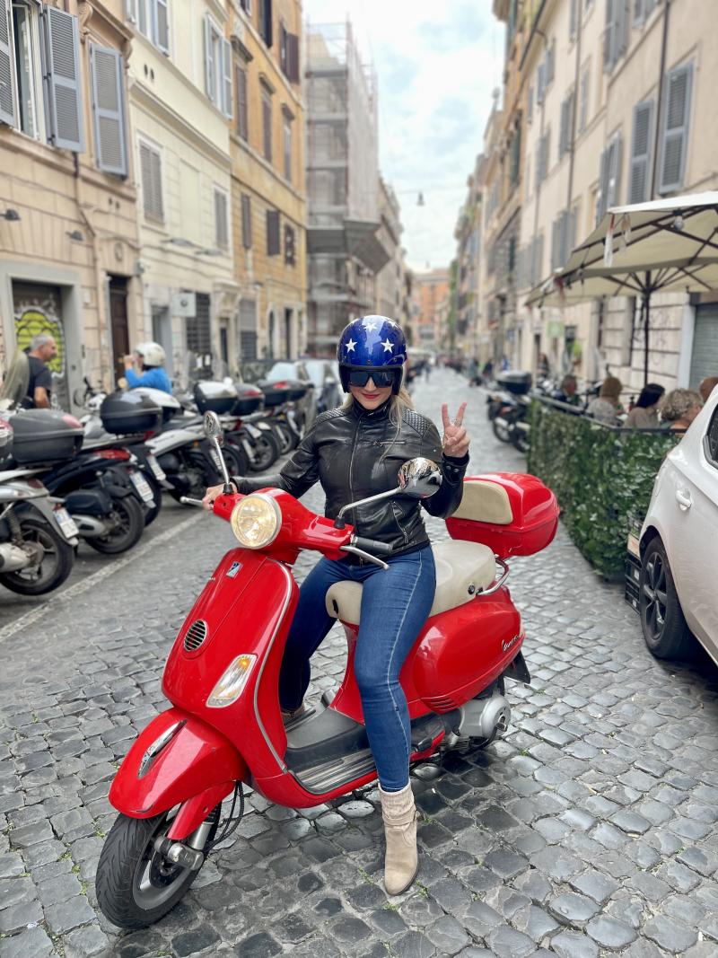 Annie Ojile on a Vespa