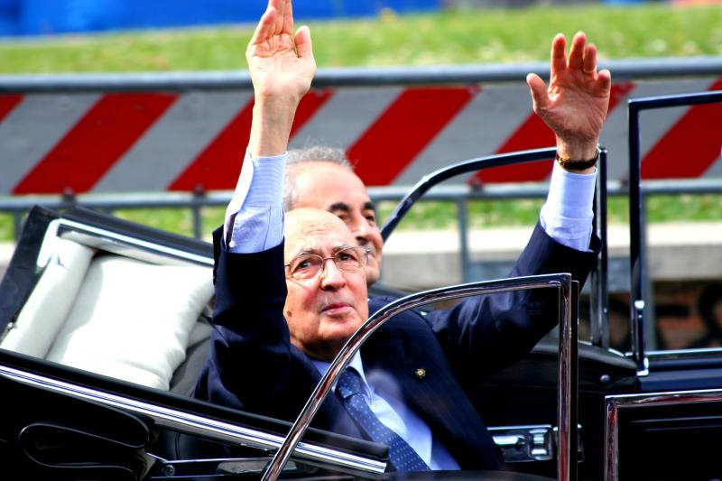 Giorgio Napolitano greets crowds at a military parade in Naples