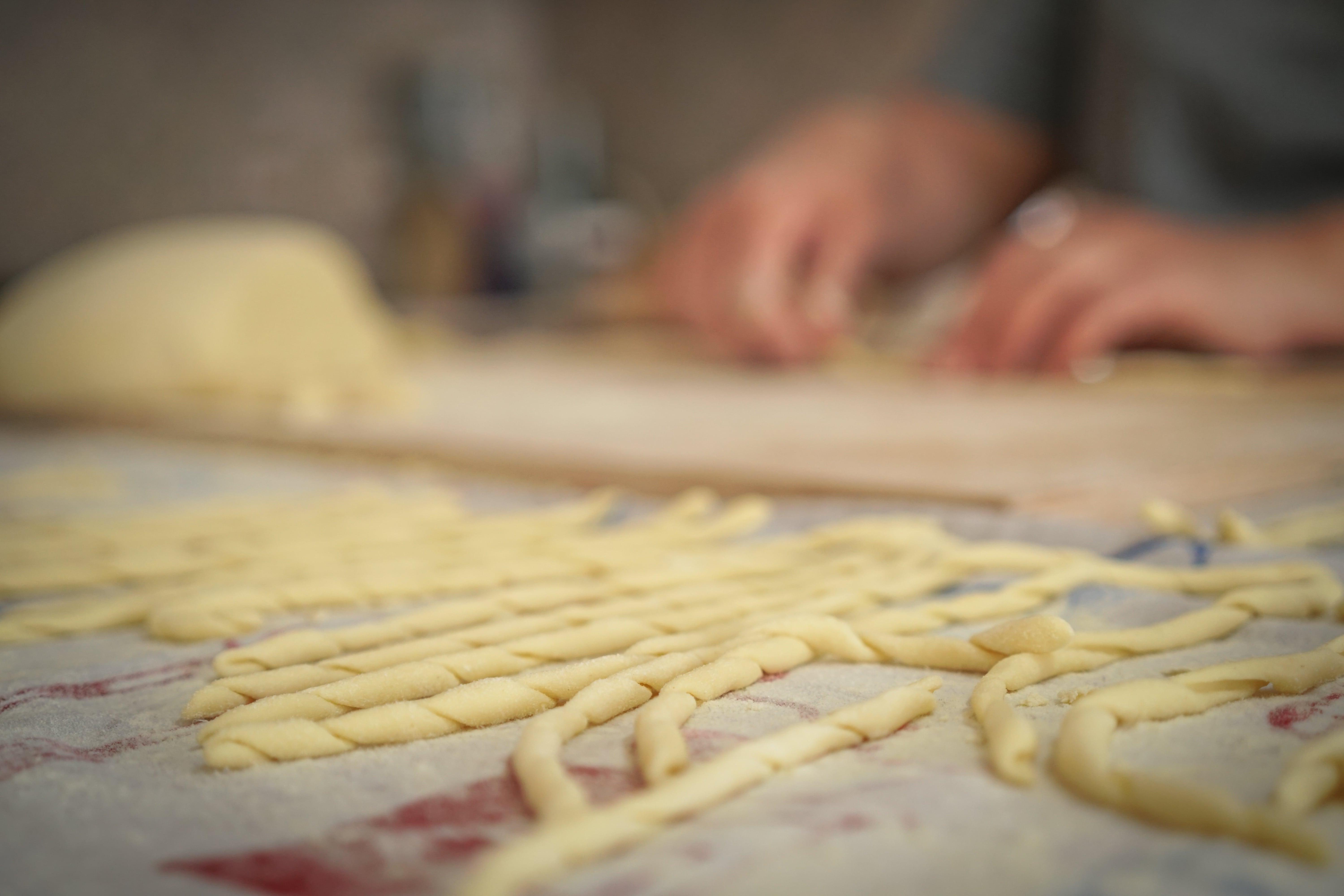 Close up of homemade fresh pasta. Homemade pasta making class in Calabria